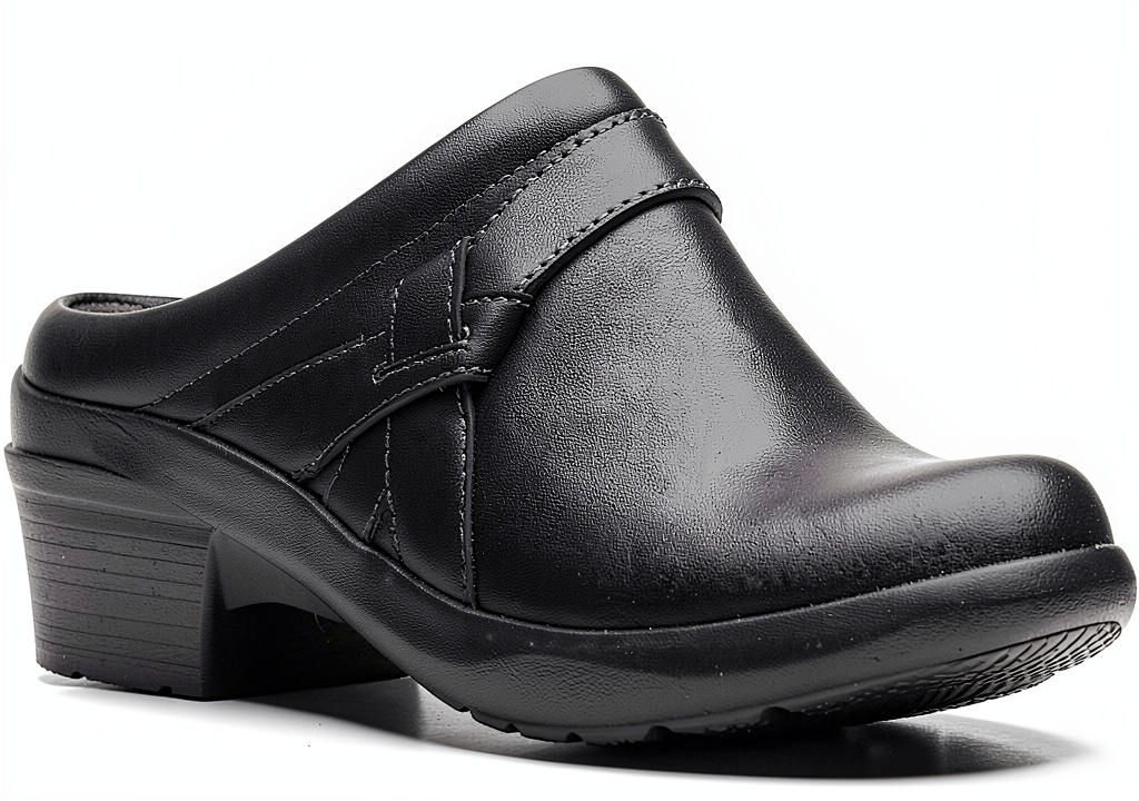 Clarks black leather mules showing side profile and footbed detail