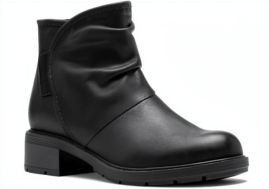 Clarks Hearth Sofia ankle boots in black leather on a neutral background
